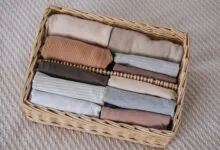 baby clothes in a wicker container vertical cloth 2023 11 27 05 36 26 utc min 1 1